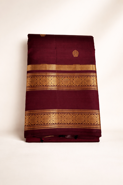 Maroon Pure Pattu Silk Saree with Rich Gold Zari Border & Traditional Motifs