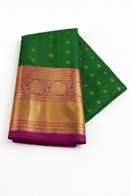 Emerald Green Kanchipuram Pattu Silk Saree with Rani Pink Border & Rich Gold Zari Pallu